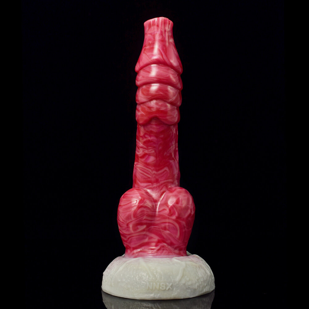 a pink knotted dildo