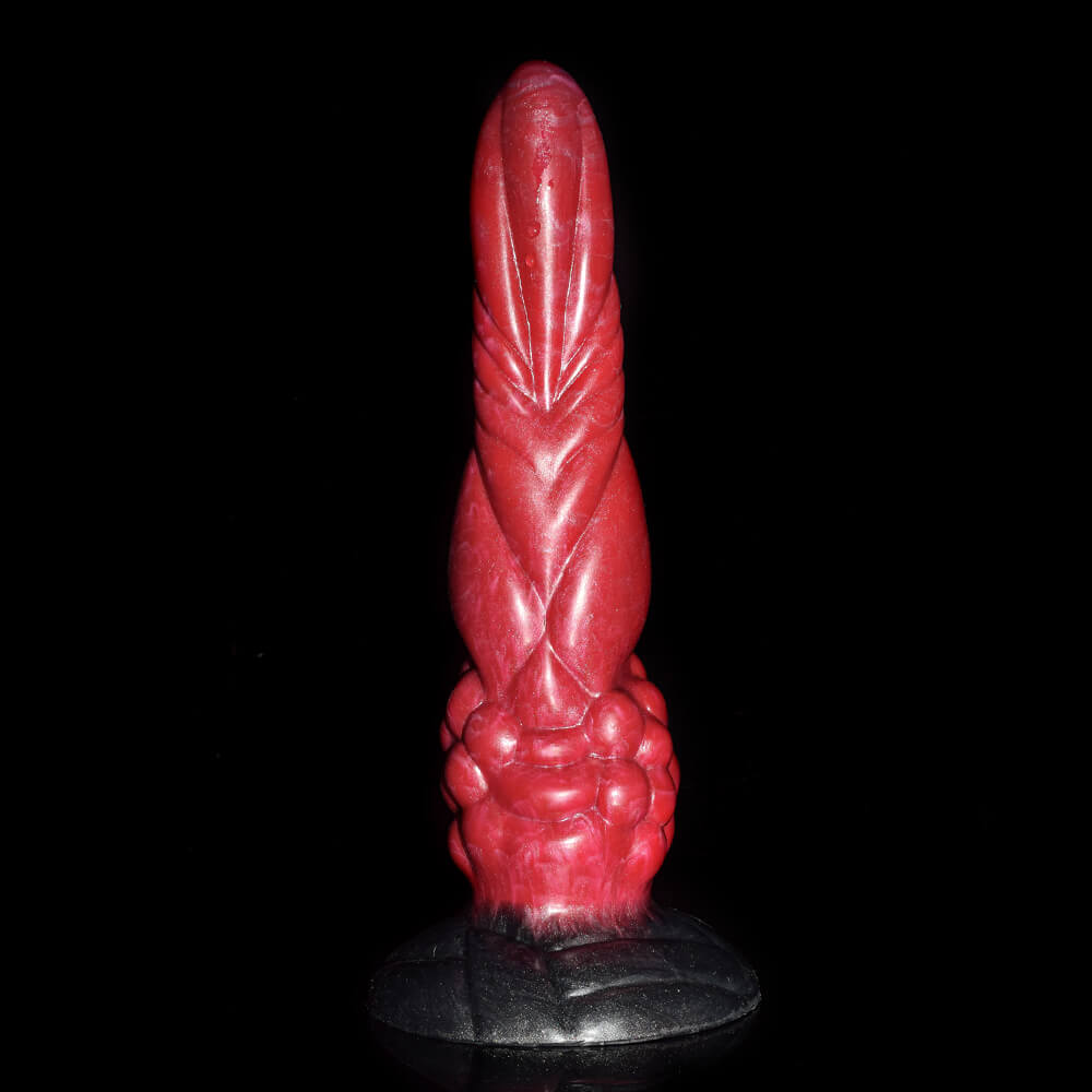 a red knotted dildo