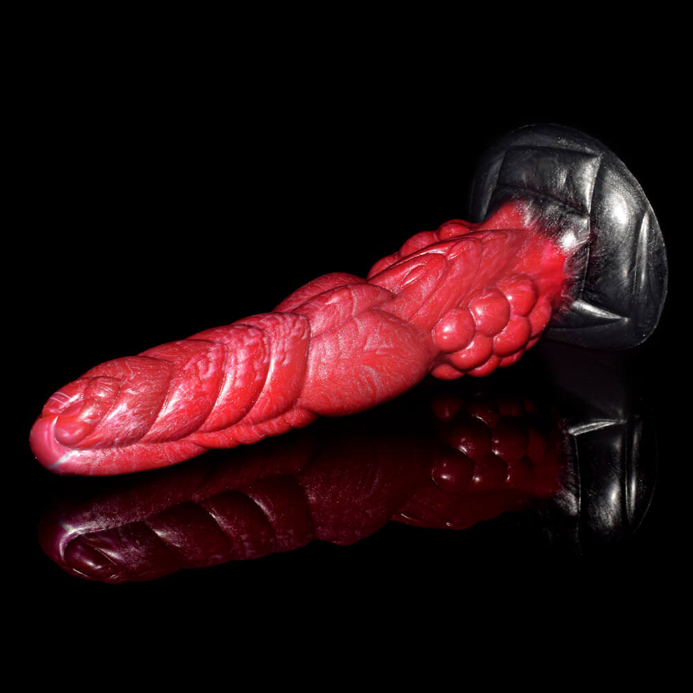 a red knotted dildo