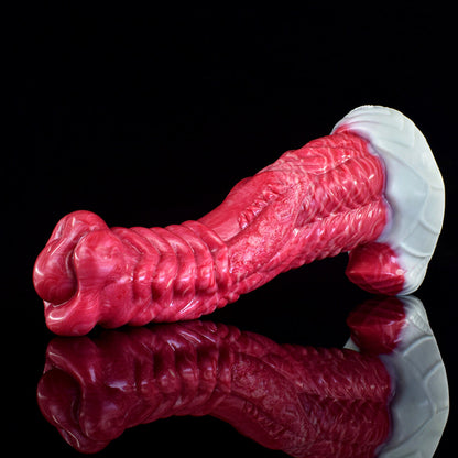 a pink knotted dildo