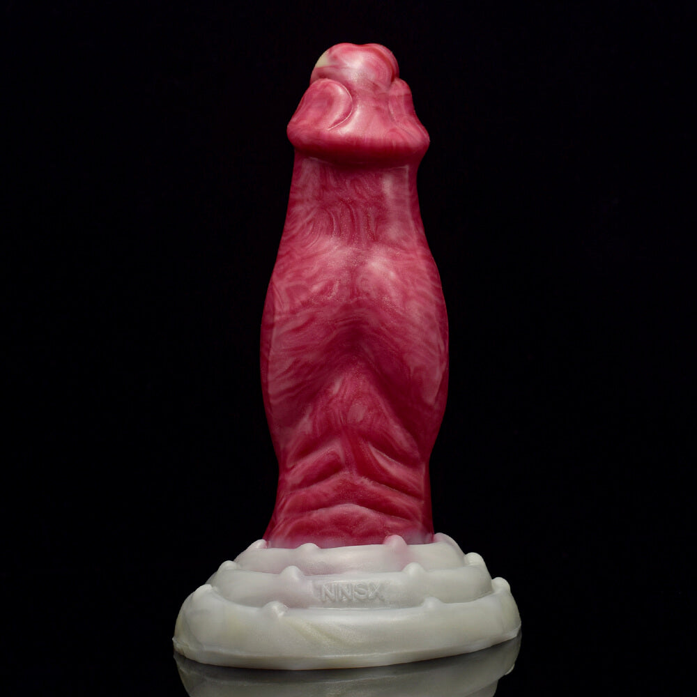 a pink knotted dildo