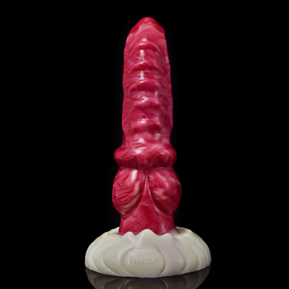 a pink knotted dildo