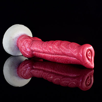 a pink knotted dildo