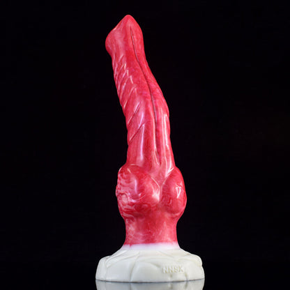 a pink knotted dildo