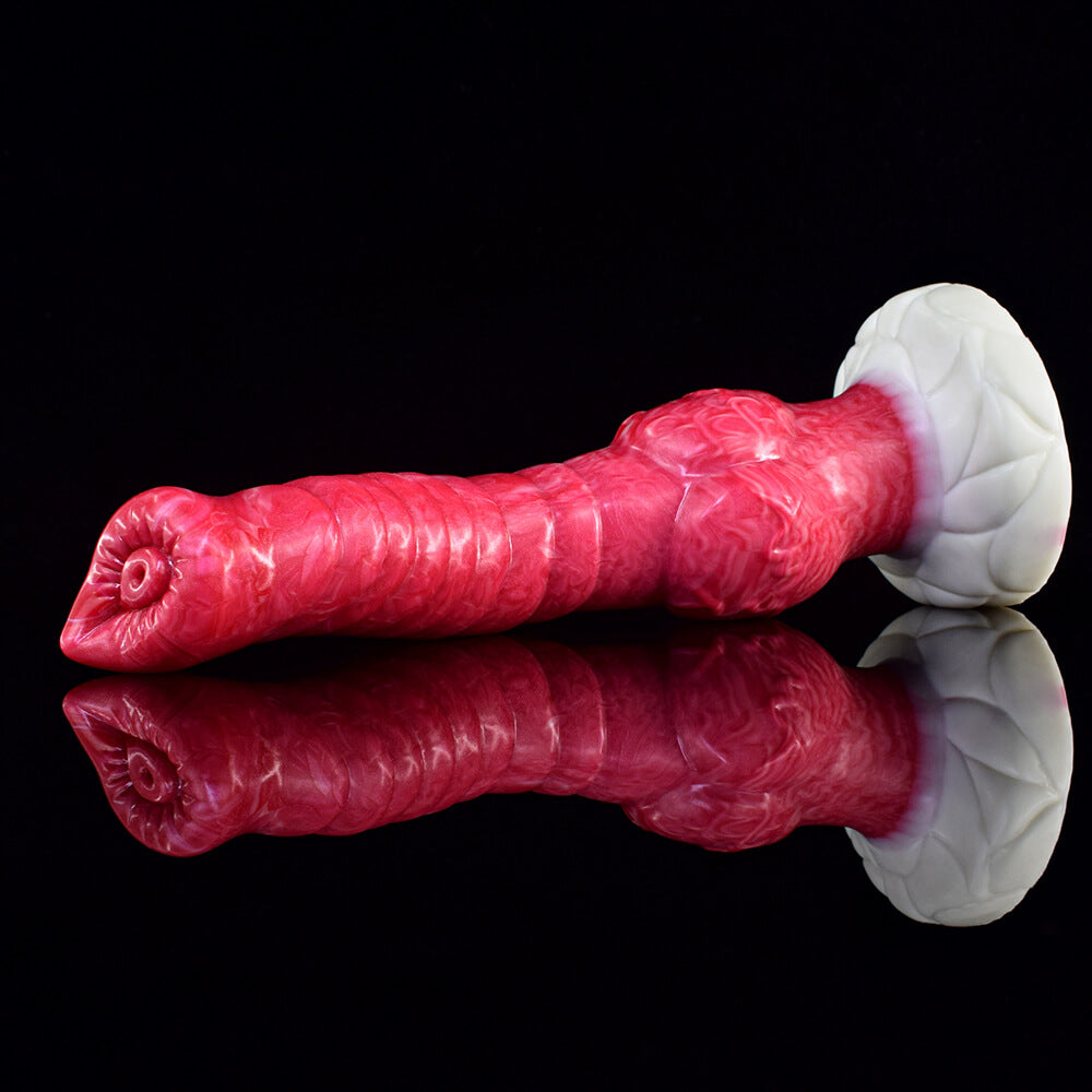 a pink knotted dildo